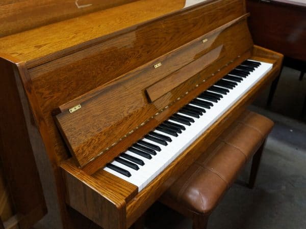 used maeari upright piano