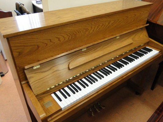 used piano store