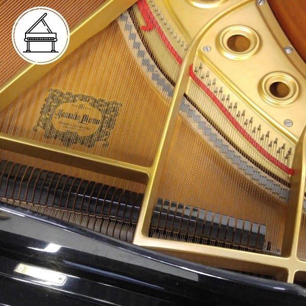 under hood of piano