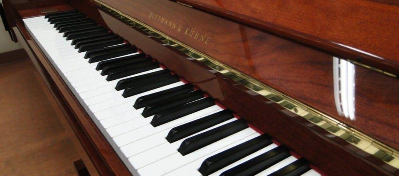 Used Piano with white piano keys
